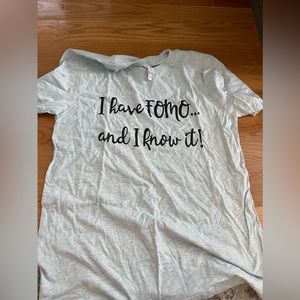 T shirt never worn - says “I have FOMO and I know it.”